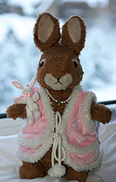 Truffles the rabbit doll watching skiers