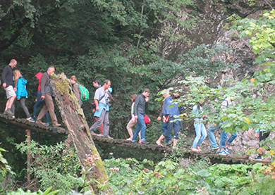 Croatia, hikers on boardwalk