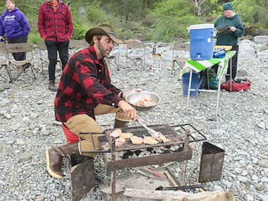 Illinois River rafting cooking dinner