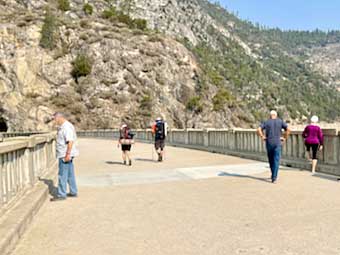 People on the rim of the Hetch Hetchy Dam