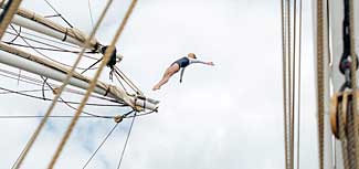 Man dives from tall ship