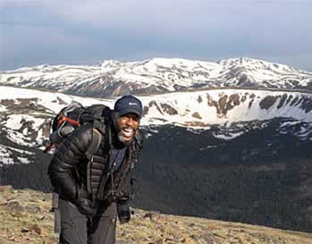 Smiling hiking man